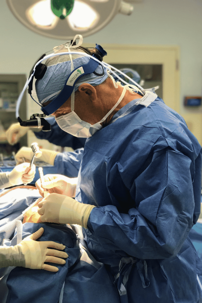 Dr. Spiro performing mommy makeover surgery