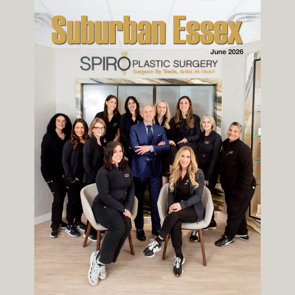 Dr. Scott Spiro with the Spiro Plastic Surgery team on the June 2026 cover of Suburban Essex magazine