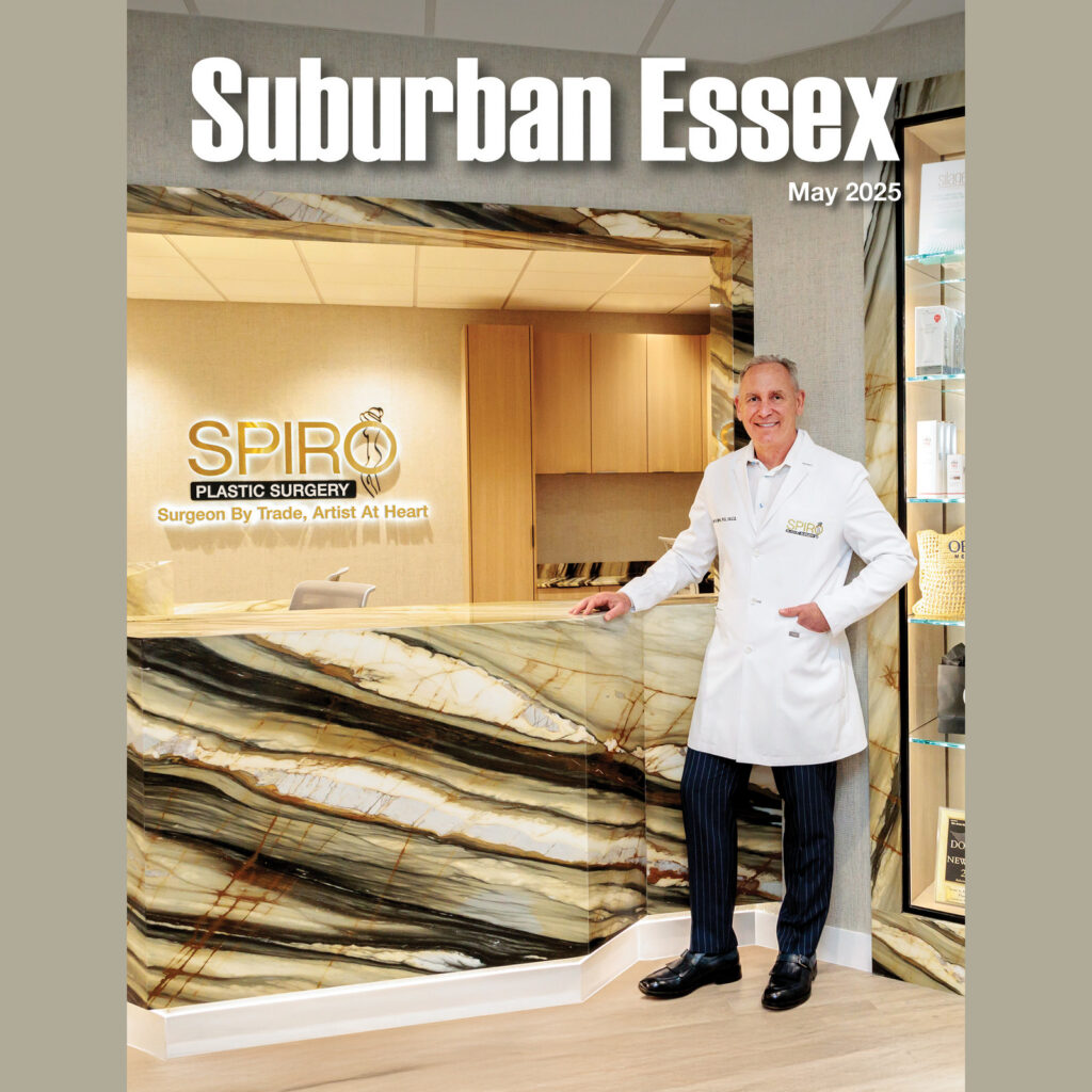 Dr. Scott Spiro inside Spiro Plastic Surgery on the May 2025 cover of Suburban Essex magazine