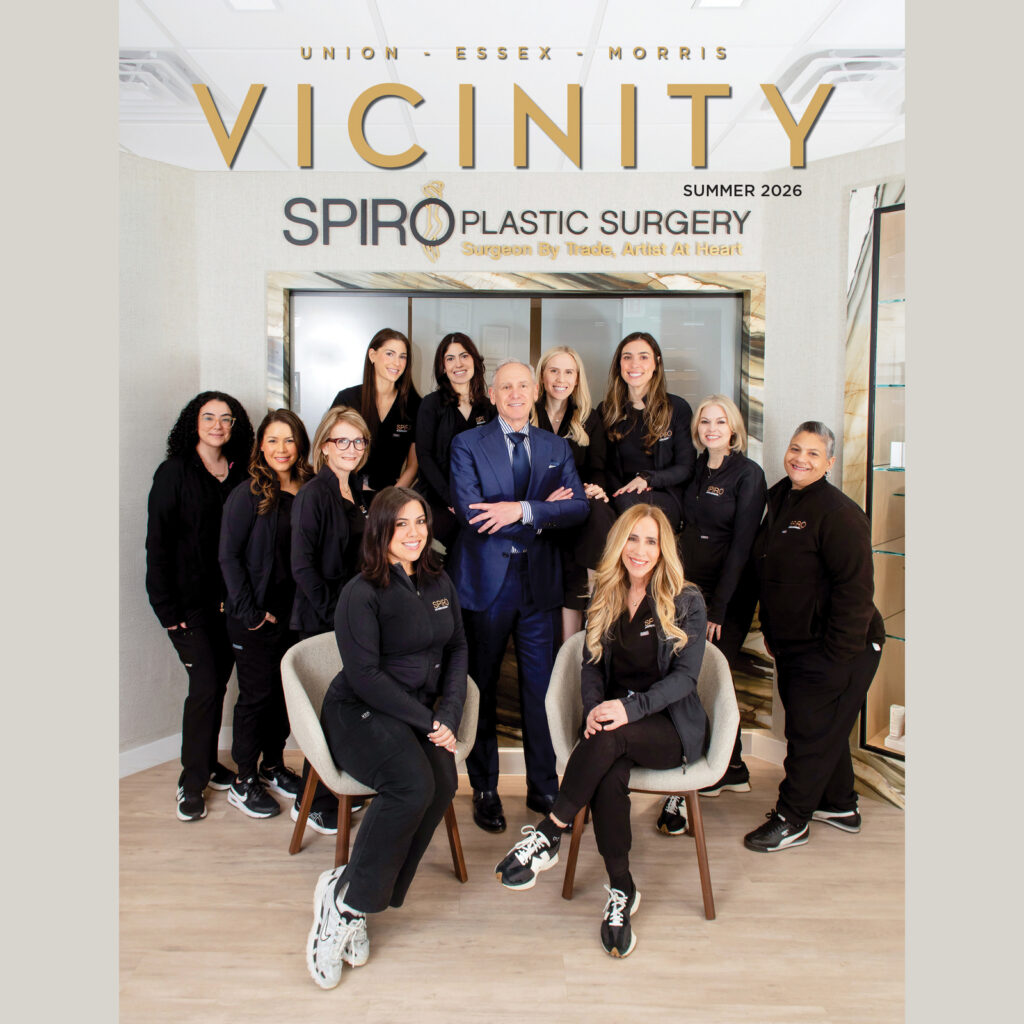 Dr. Scott Spiro with the Spiro Plastic Surgery team on the Summer 2026 Vicinity magazine cover